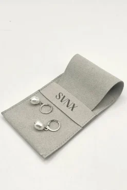 Baroque Pearl Earrings In Silver by SVNX