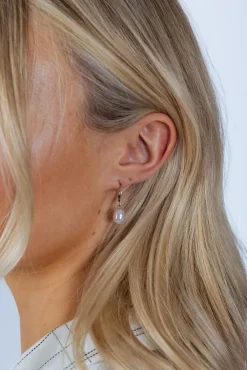 Baroque Pearl Earrings In Silver by SVNX