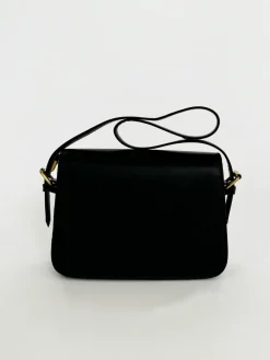 Black Shoulder Bag With Gold Clasp Fastening by SVNX