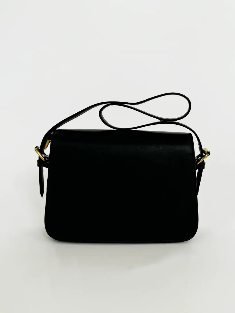 Black Shoulder Bag With Gold Clasp Fastening by SVNX