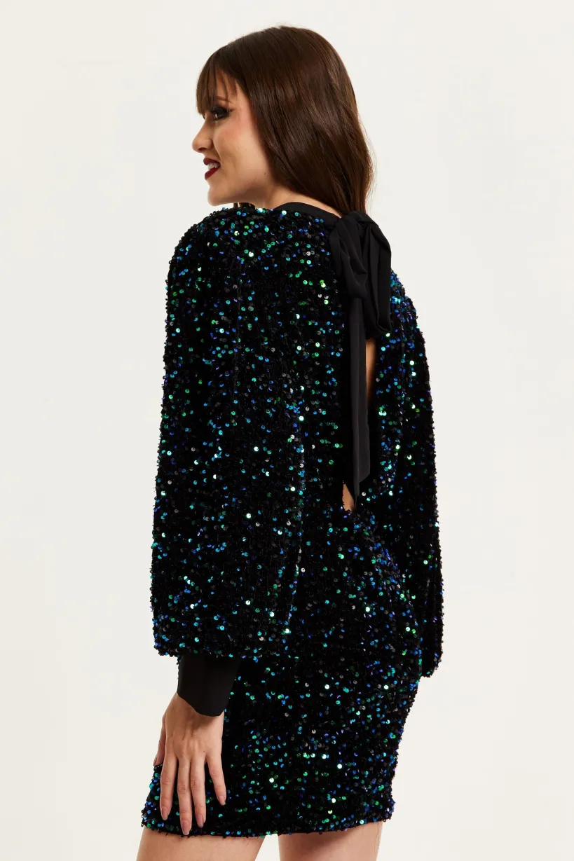 Black Velvet Based Green And Blue Sequin Mini Dress by Liquorish