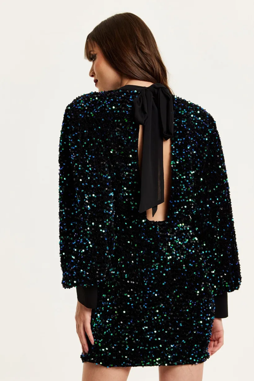 Black Velvet Based Green And Blue Sequin Mini Dress by Liquorish