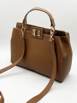 Brown Faux Leather Handbag With Gold Trim by SVNX