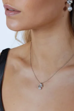 Dainty Bow Pearl Pendant Necklace by SVNX