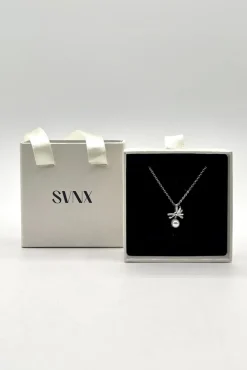 Dainty Bow Pearl Pendant Necklace by SVNX