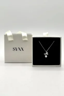 Dainty Bow Pearl Pendant Necklace by SVNX