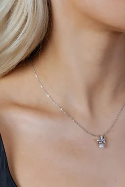 Dainty Bow Pearl Pendant Necklace by SVNX