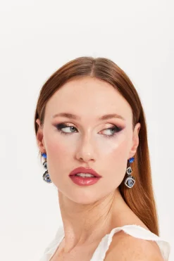 Double Evil Eye Drop Style Earrings With Diamonte Embellishments by Liquorish