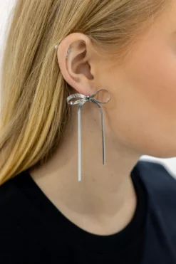 Flat Chain Bow Earring In Silver by Last True Angel