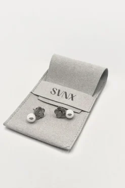 Floral Pearl Stud Earrings In Silver by SVNX
