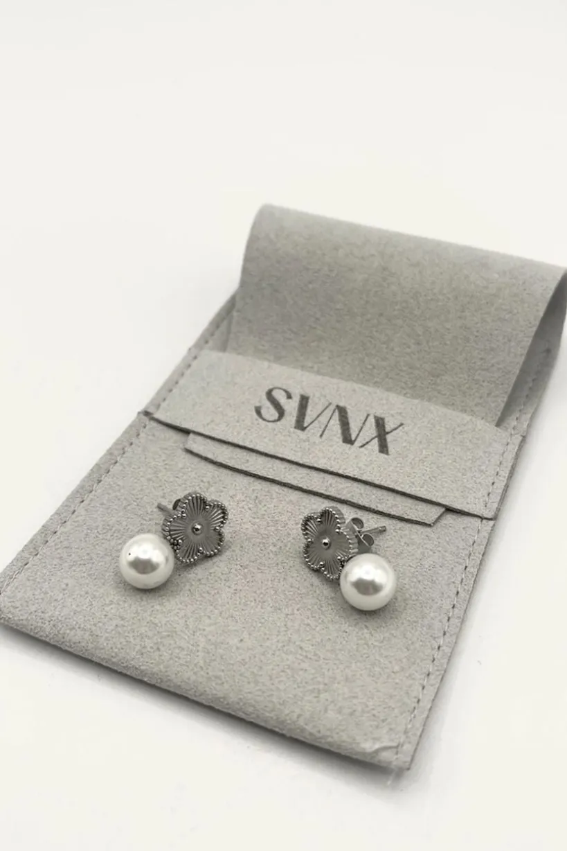 Floral Pearl Stud Earrings In Silver by SVNX