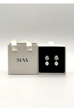 Flower Drop Pearl Earrings In Silver by SVNX