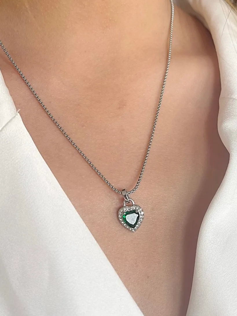 Green Diamante Heart Necklace And Earrings Set In Silver by SVNX