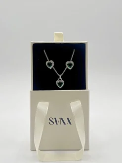 Green Diamante Heart Necklace And Earrings Set In Silver by SVNX