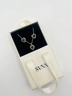 Green Diamante Heart Necklace And Earrings Set In Silver by SVNX