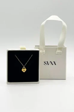 Heart Keyhole Pendant Necklace In Gold by SVNX