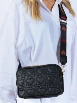 Heart Quilted Crossbody Camera Bag In Black by SVNX