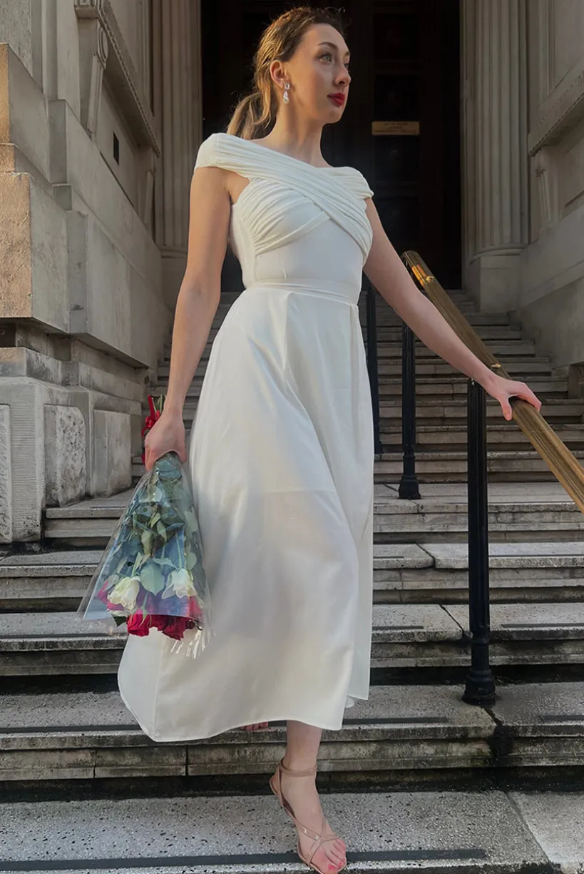 Ivory Pleated Flared Midi Skirt by InFlair