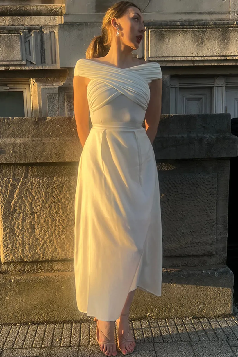 Ivory Pleated Flared Midi Skirt by InFlair