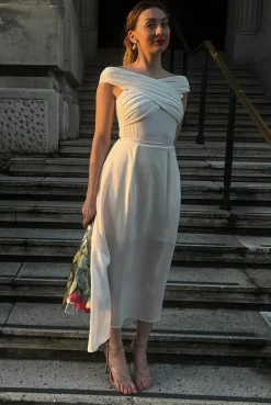 Ivory Pleated Flared Midi Skirt by InFlair
