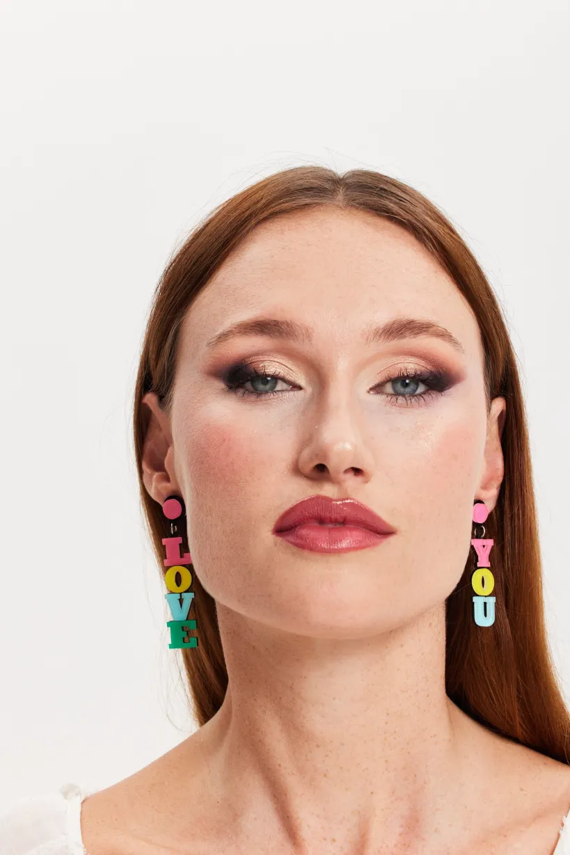 Love You Drop Style Earrings In Multi Colour by Liquorish