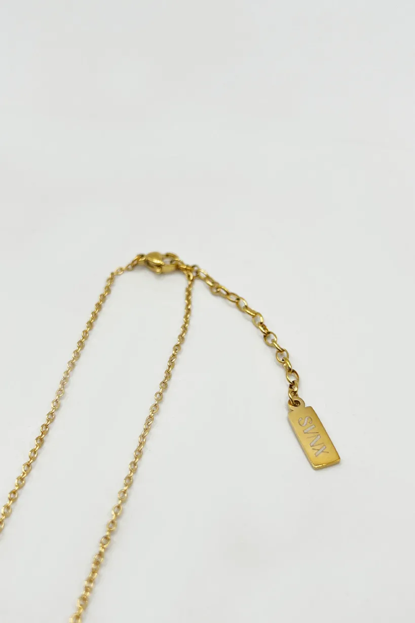 Mini Clover Necklace In Gold Black - Gift Boxed by SVNX