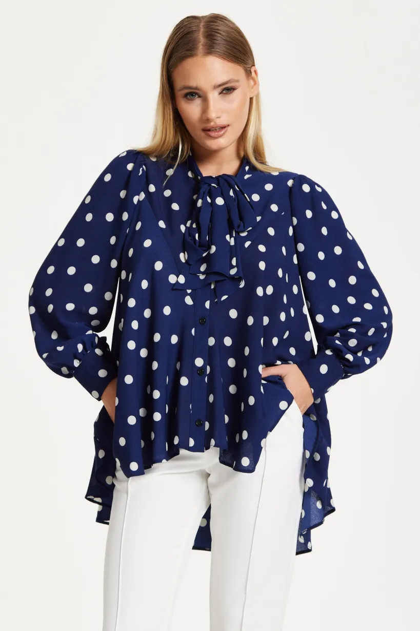 Navy Polka Dot Flared Hem Blouse by Liquorish