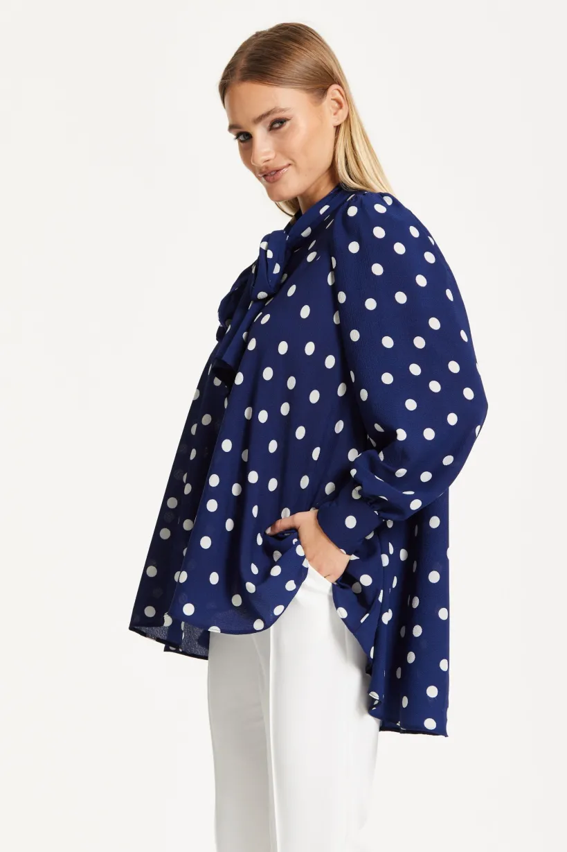 Navy Polka Dot Flared Hem Blouse by Liquorish