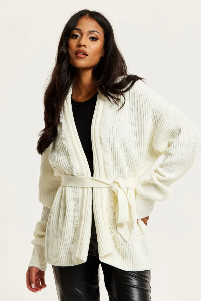 Open Front Cream Cardigan With Fringe Details by Liquorish