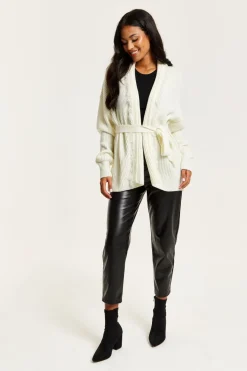 Open Front Cream Cardigan With Fringe Details by Liquorish