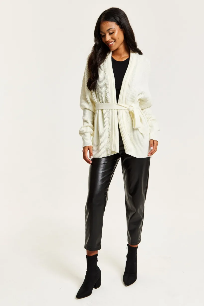 Open Front Cream Cardigan With Fringe Details by Liquorish