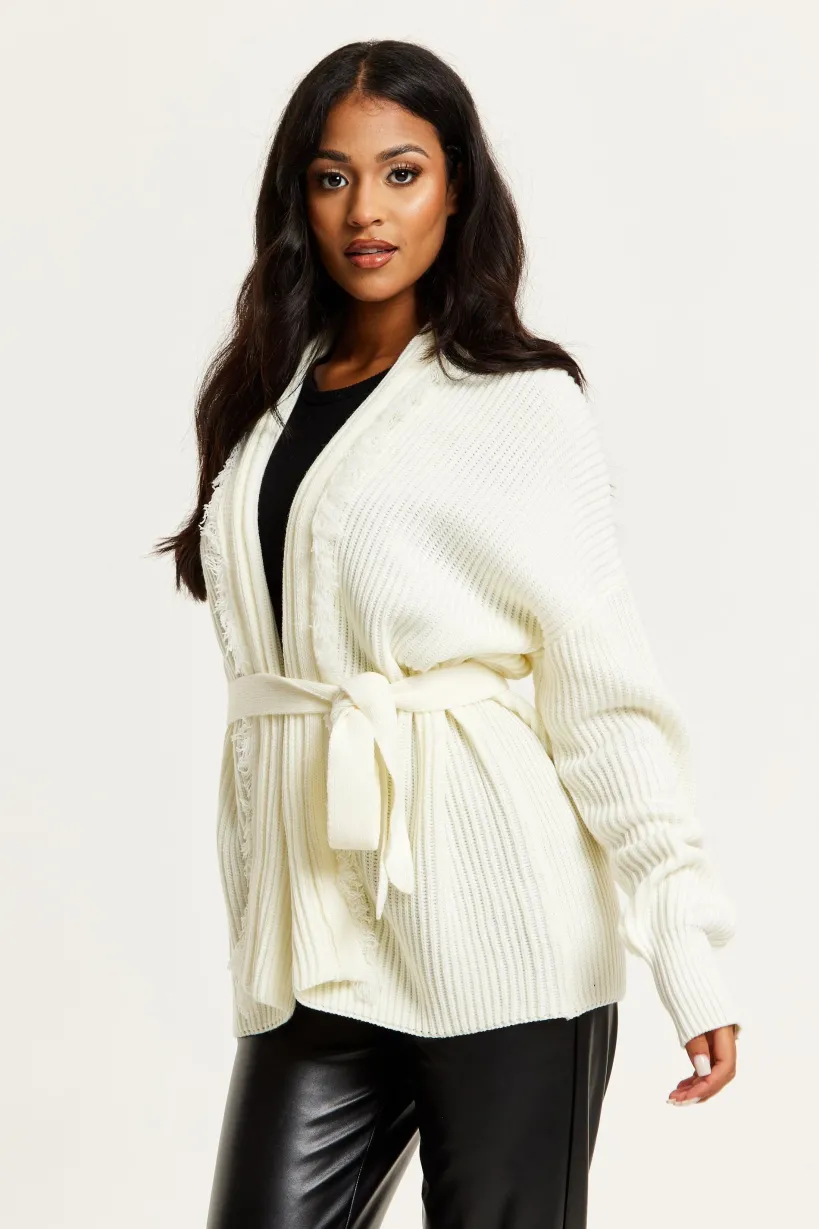 Open Front Cream Cardigan With Fringe Details by Liquorish