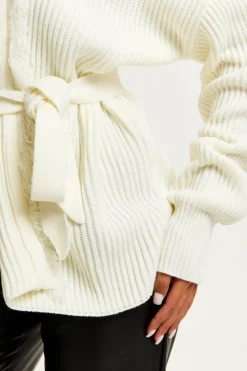 Open Front Cream Cardigan With Fringe Details by Liquorish