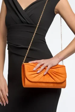 Orange Suede Clutch Bag With Knot Detail by Aftershock London