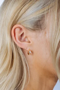 Oval Crystal Huggie Hoops by SVNX