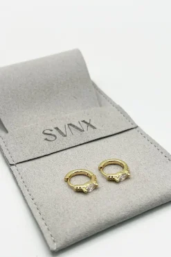 Oval Crystal Huggie Hoops by SVNX
