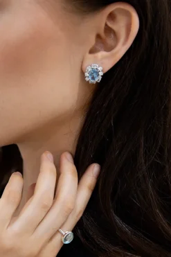 Oval Cubic Zirconia Surround Earring In Light Blue & Gold by Last True Angel
