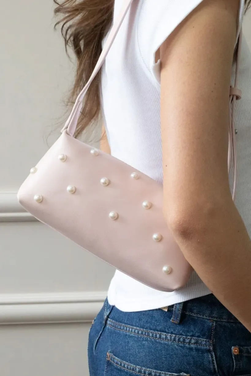 Pink Shoulder Bag With Pearl Studs by SVNX