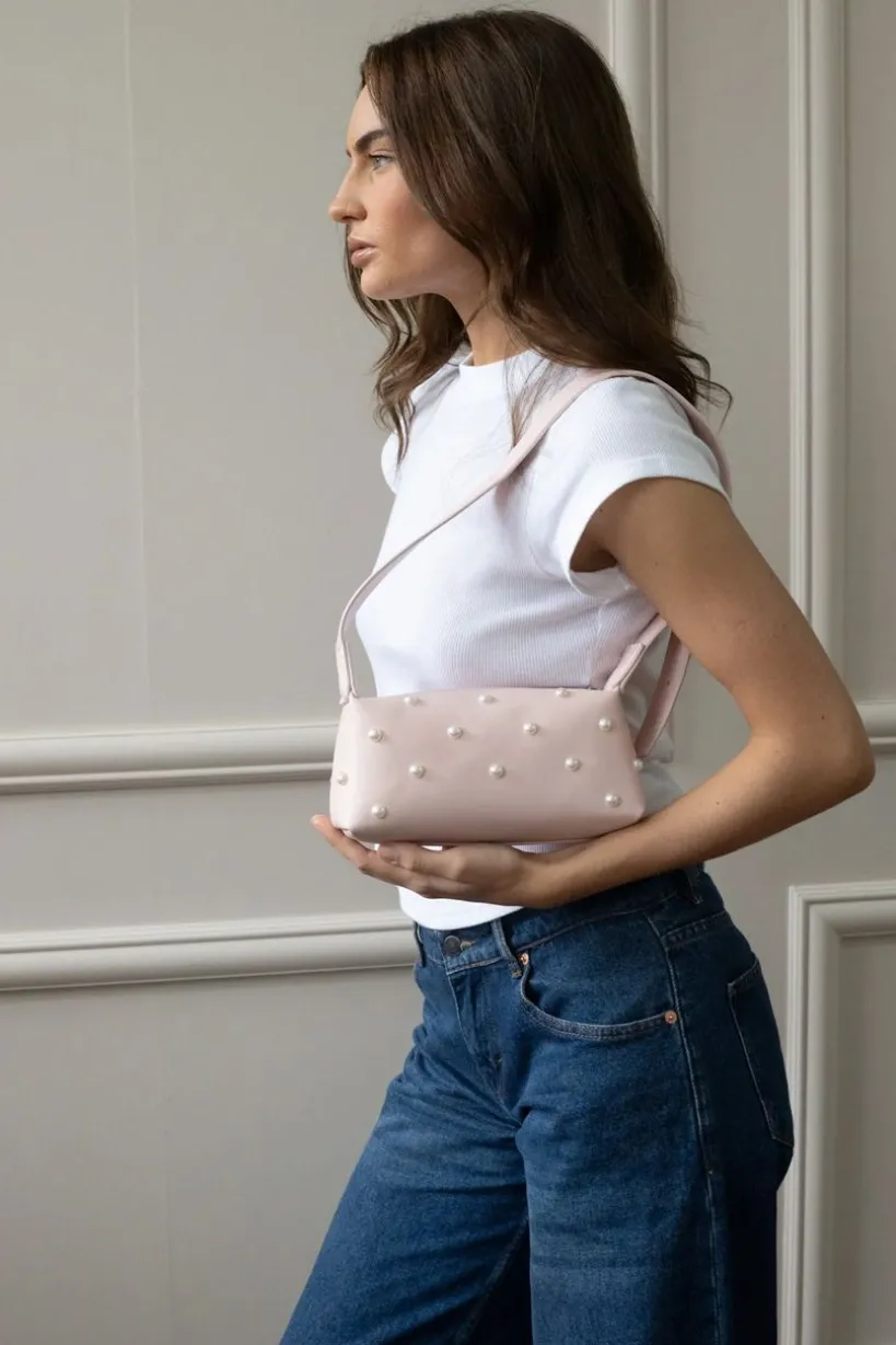 Pink Shoulder Bag With Pearl Studs by SVNX