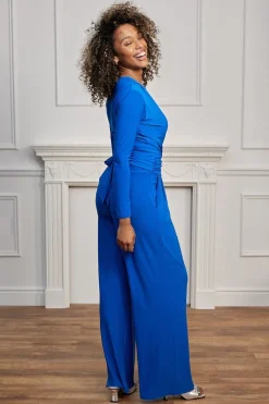 Plunge Wrap Long Sleeve Jumpsuit With Tie Back In Royal Blue by Angeleye