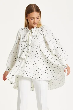 Polka Dot Ruffle High-Low Blouse by Liquorish