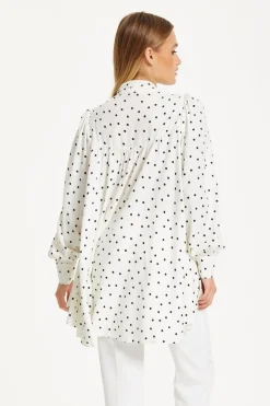 Polka Dot Ruffle High-Low Blouse by Liquorish