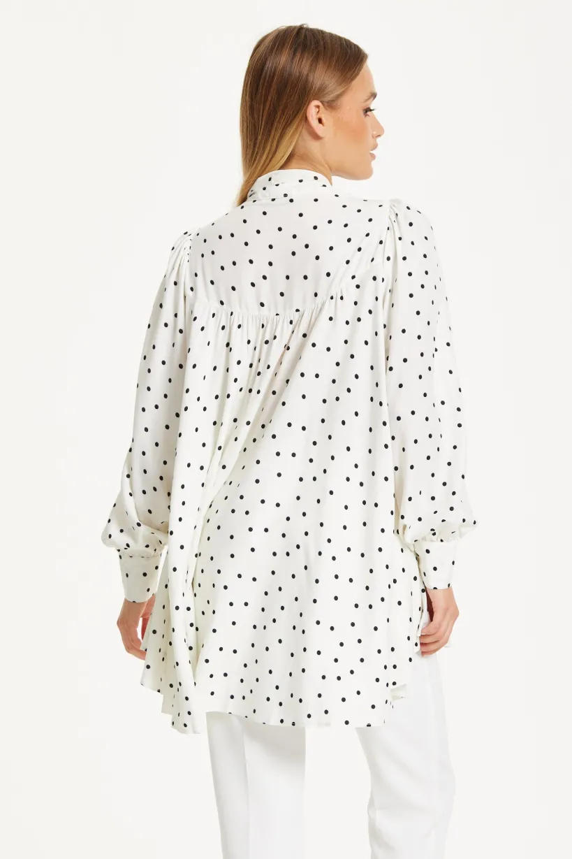 Polka Dot Ruffle High-Low Blouse by Liquorish