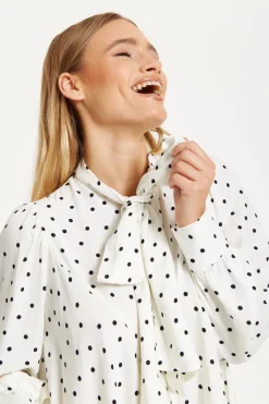 Polka Dot Ruffle High-Low Blouse by Liquorish