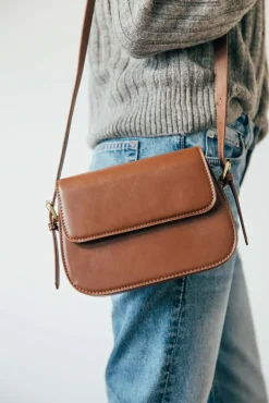 Rounded Cross Body Bag In Brown by SVNX