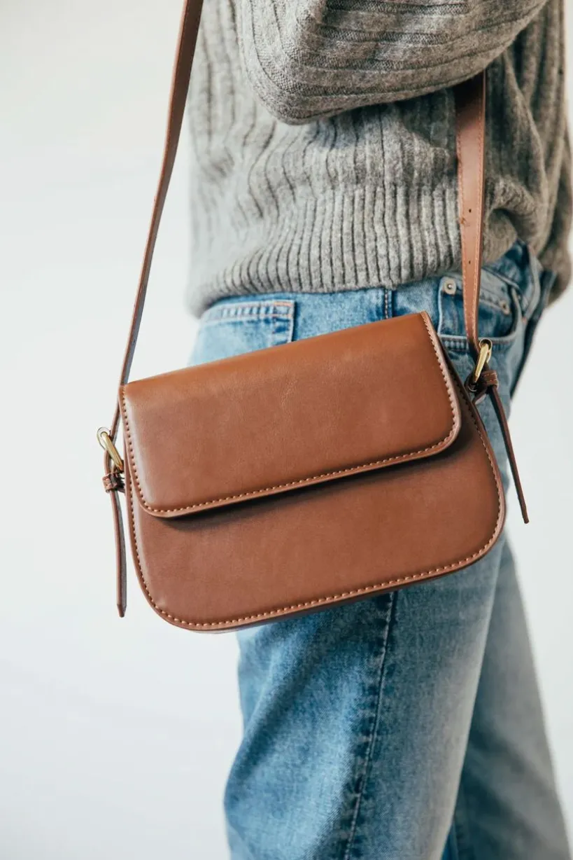 Rounded Cross Body Bag In Brown by SVNX